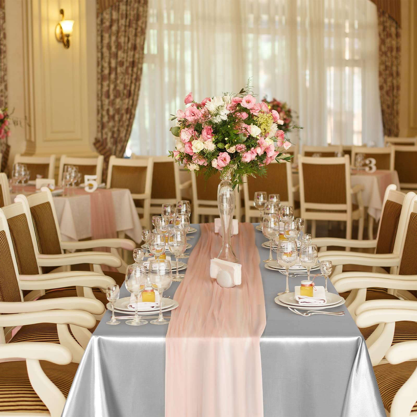TURSTIN banquet setup with silver satin tablecloth creating inviting decor