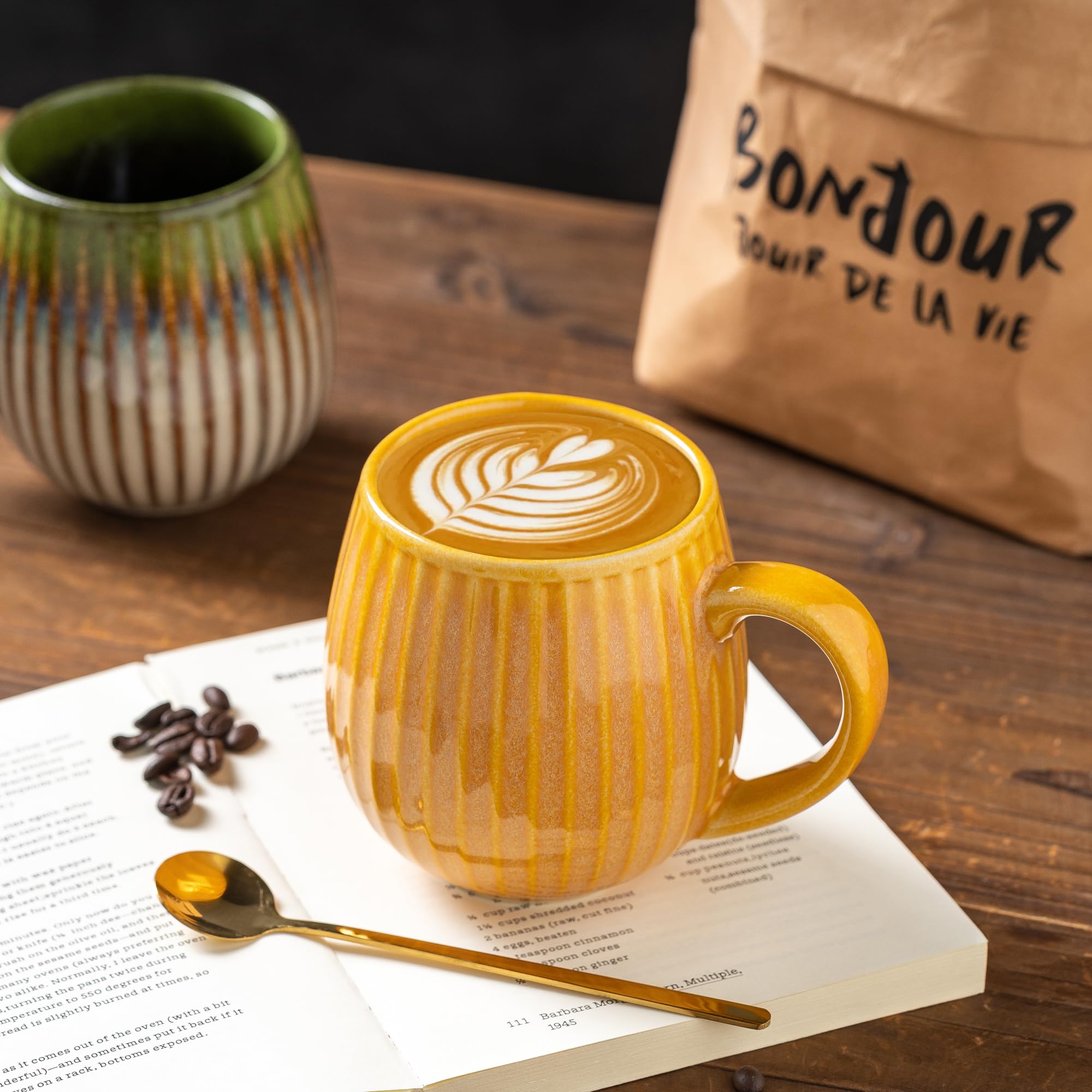 Tvvtuww stoneware handcrafted drum shape mug for comfortable grip.