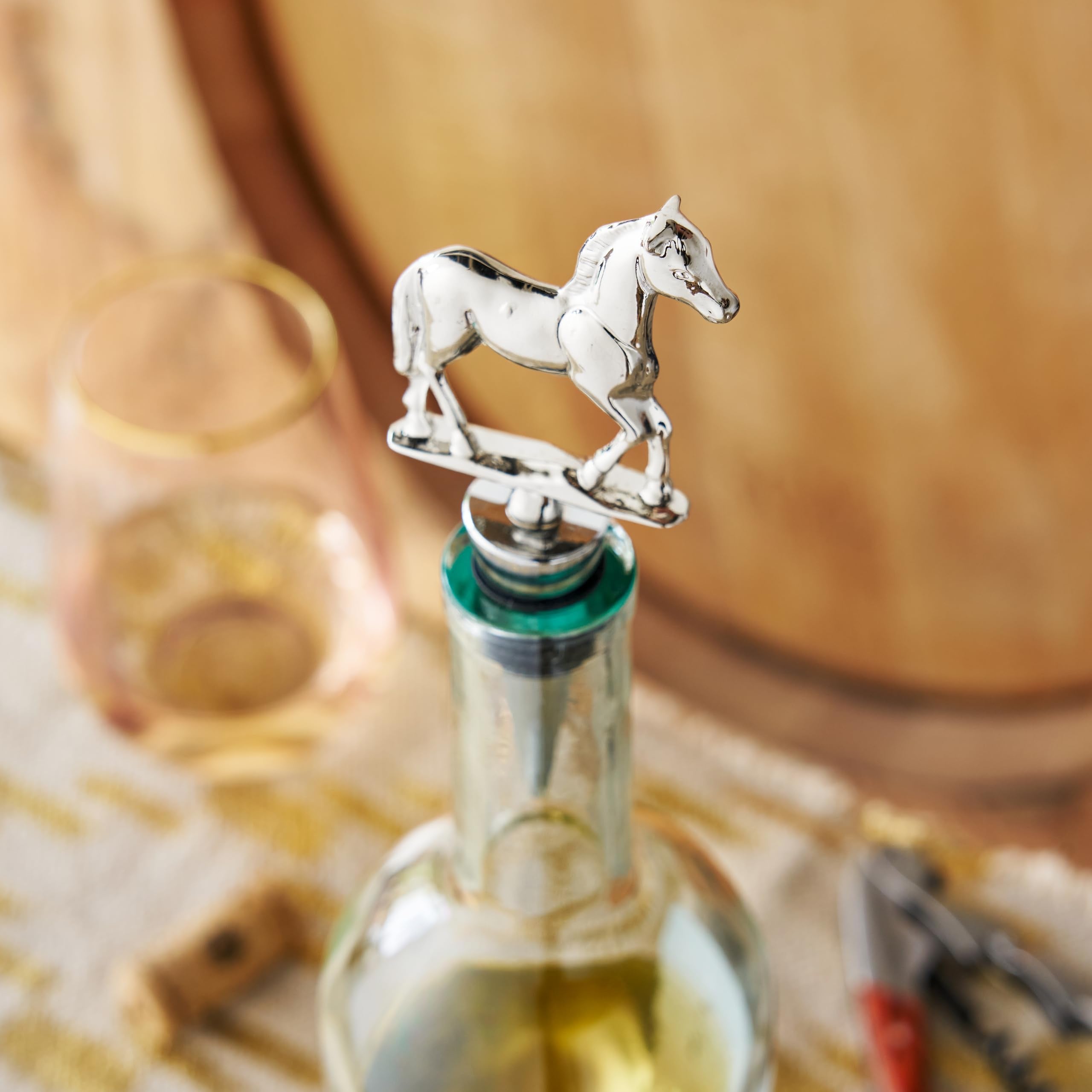 Silver Twine Derby stopper sits atop a bottle for decorative charm and seal