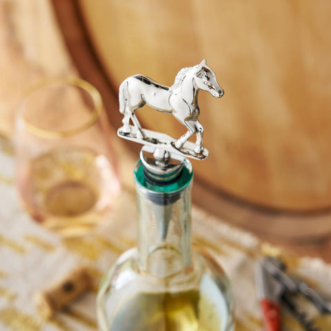 Silver Twine Derby stopper sits atop a bottle for decorative charm and seal