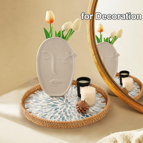 Tynulox light blue leaf motif complements coastal or modern decor.