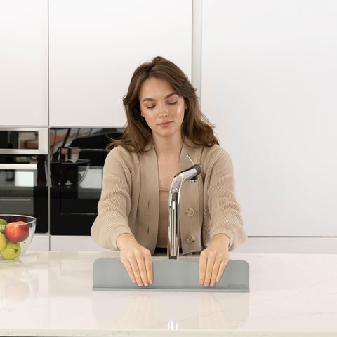 TYOARO bathroom-use silicone guard showing versatile use around the sink