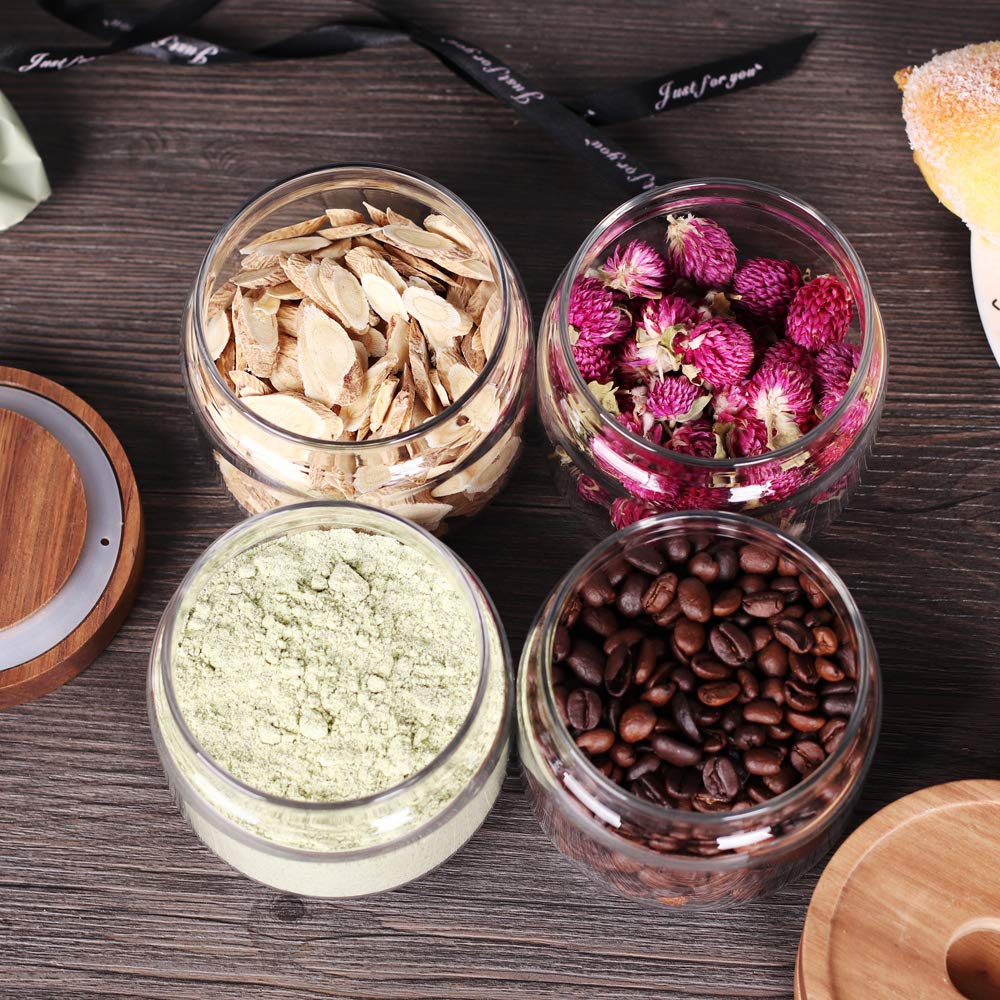 Tzerotone cute glass jars add style to a tidy kitchen.