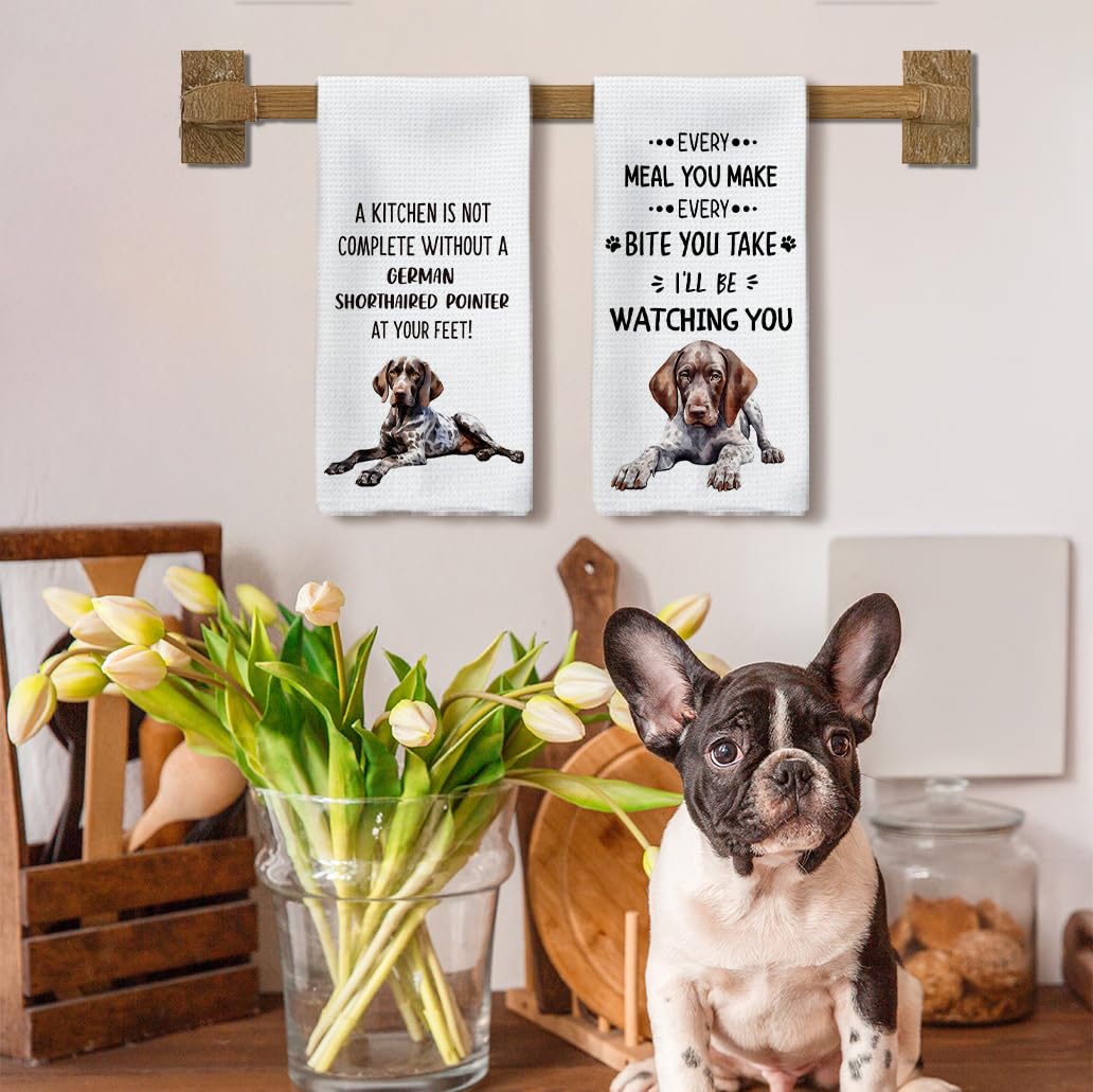 Tzhim dog hand towels decorate kitchens with playful patterns while drying hands.