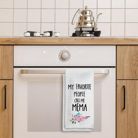 Tzhim Mema Gifts housewarming towel pattern adds charm during cleanup tasks.
