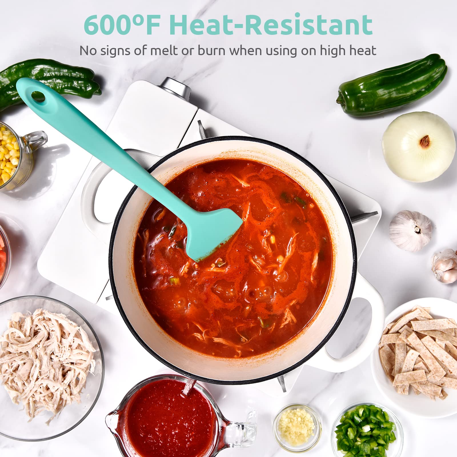 U-Taste Aqua Sky spatula with curved and straight edges for batter and sauces.