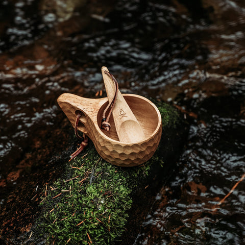 ueberleben Kuksa cup with leather lanyard and carabiner for easy trail transport.