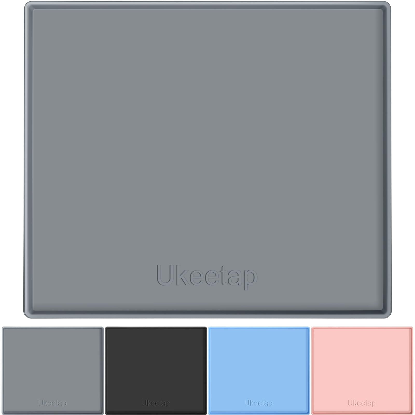 Ukeetap extra thick silicone mat with raised edge protects floors from spills.
