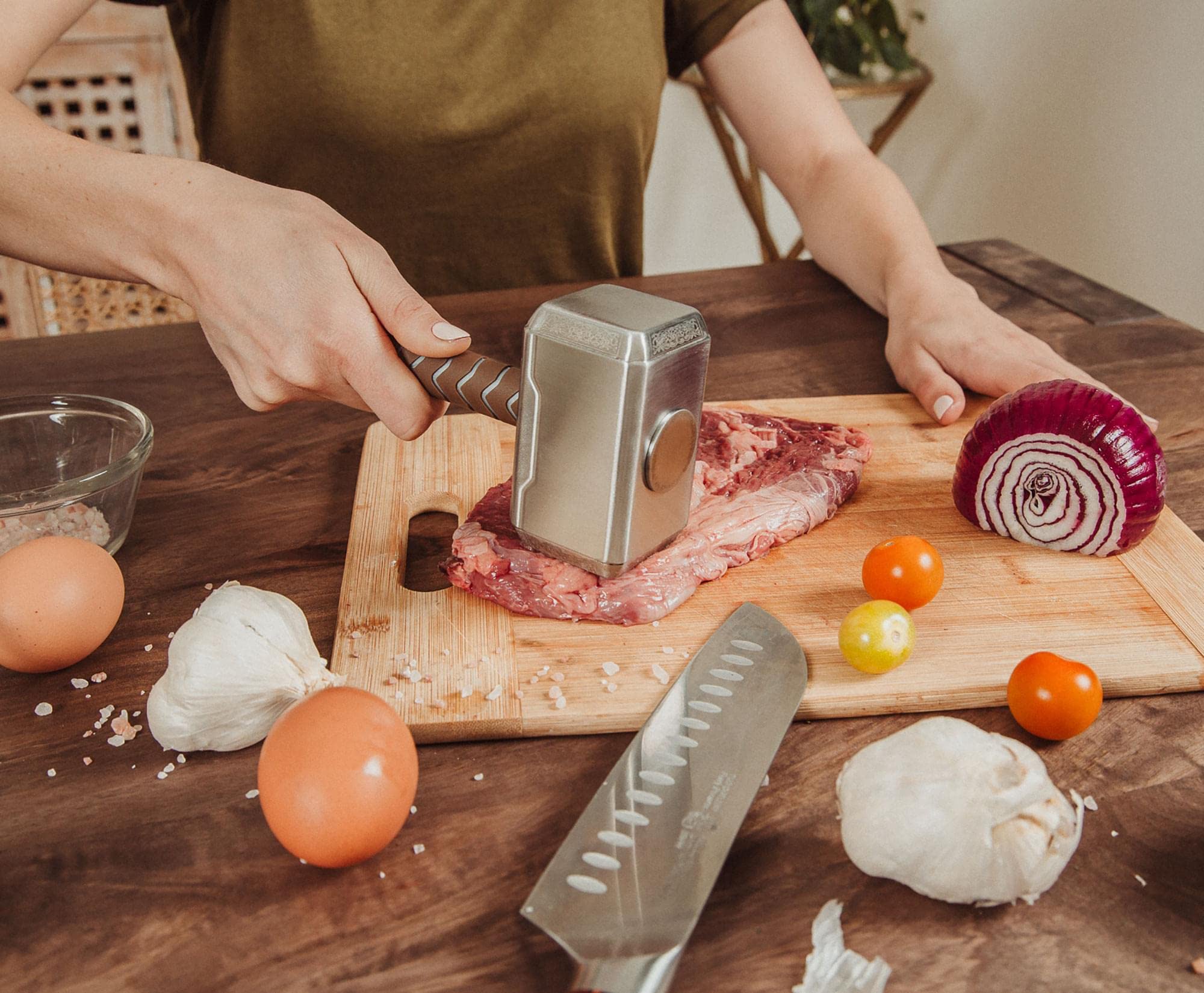 Ukonic Thor Mjolnir display-ready replica on a kitchen counter.