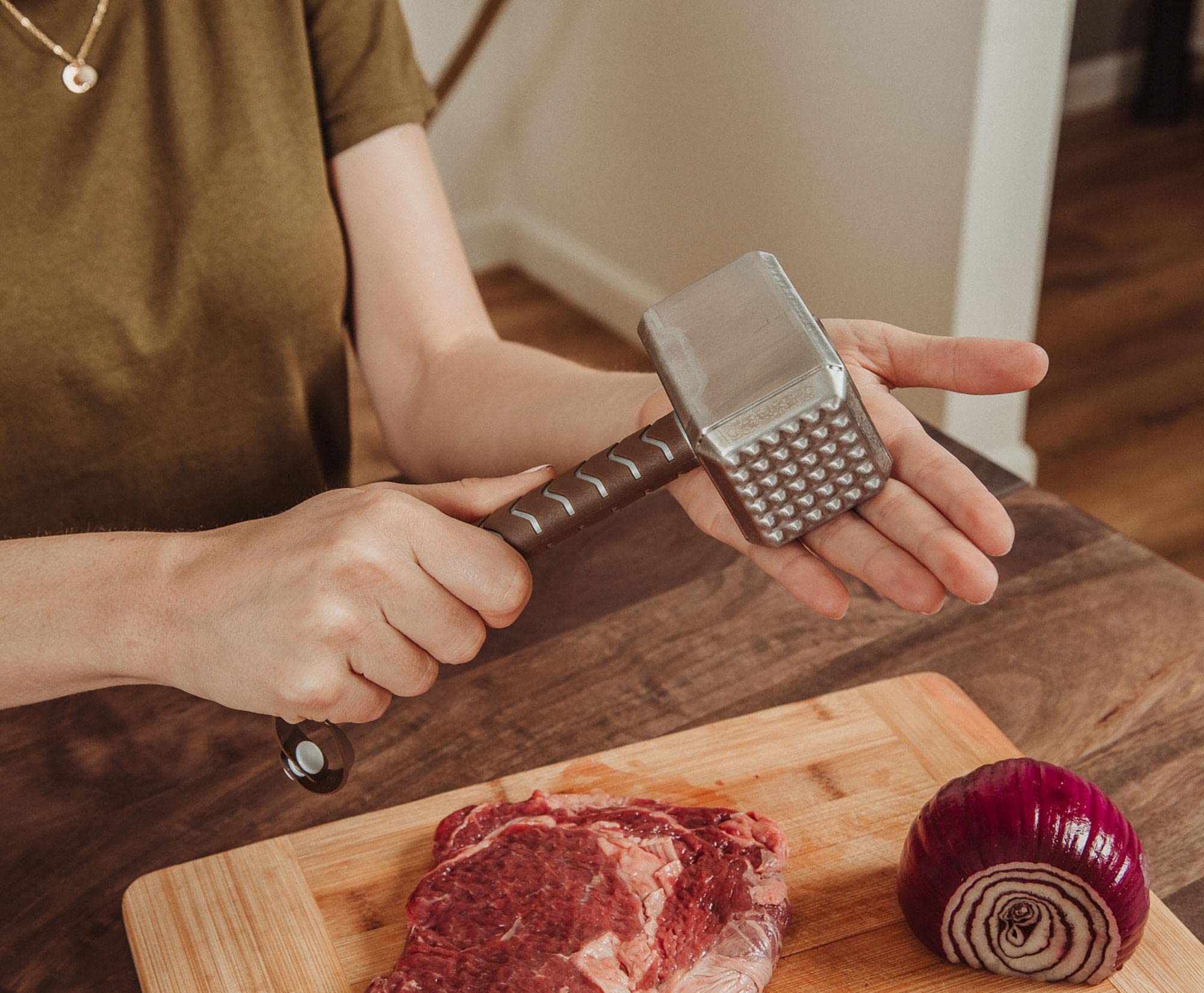 Ukonic Thor Mjolnir ergonomic handle with PVC strap for easy hanging.