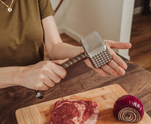 Ukonic Thor Mjolnir ergonomic handle with PVC strap for easy hanging.