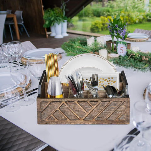 Ukonvi carved brown wood utensil caddy adds rustic kitchen charm.