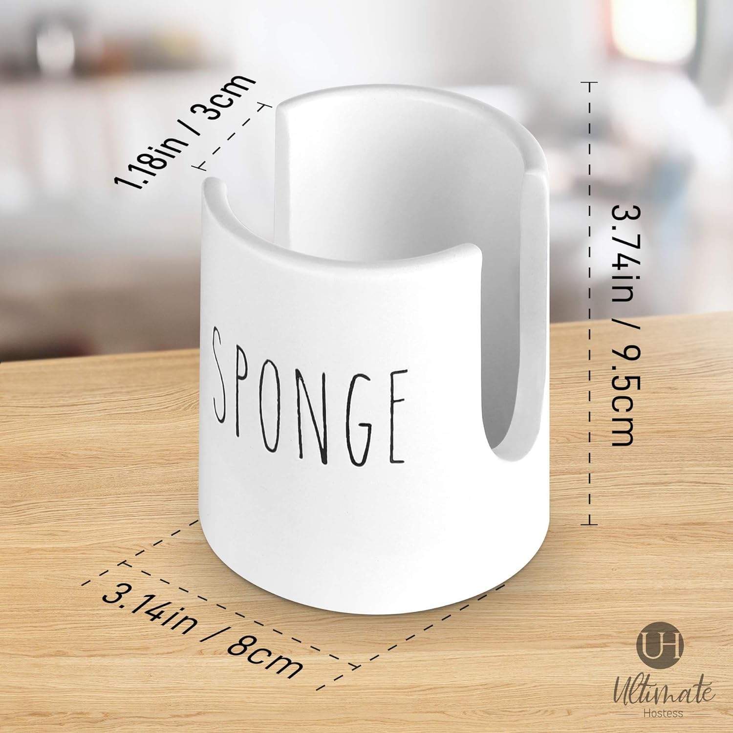 Ultimate Hostess sponge holder near the faucet, showcasing farmhouse charm and organization.