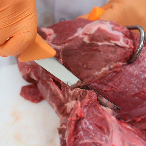 ULTRASOURCE boning knife curved blade in use for precise cuts