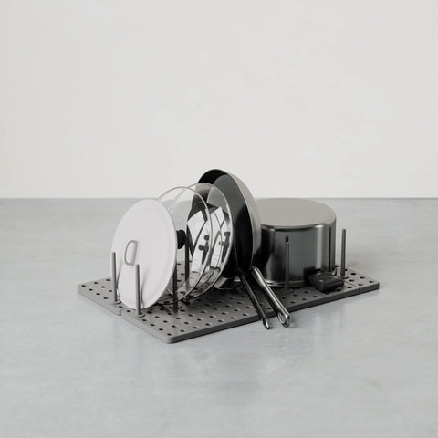 Peggy peg configuration adapts to containers and cookware for flexible storage