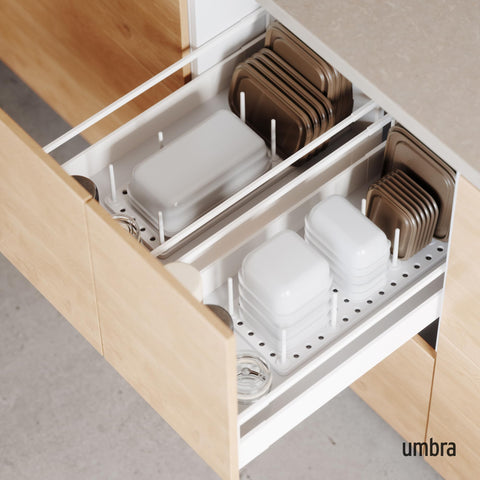 Umbra Peggy removable pegs enabling flexible reconfiguration for changing kitchen needs