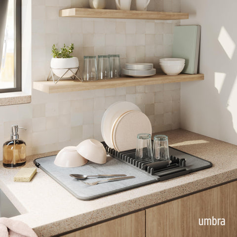 Umbra Udry foldable drying rack demonstrates space-saving design for small kitchens.
