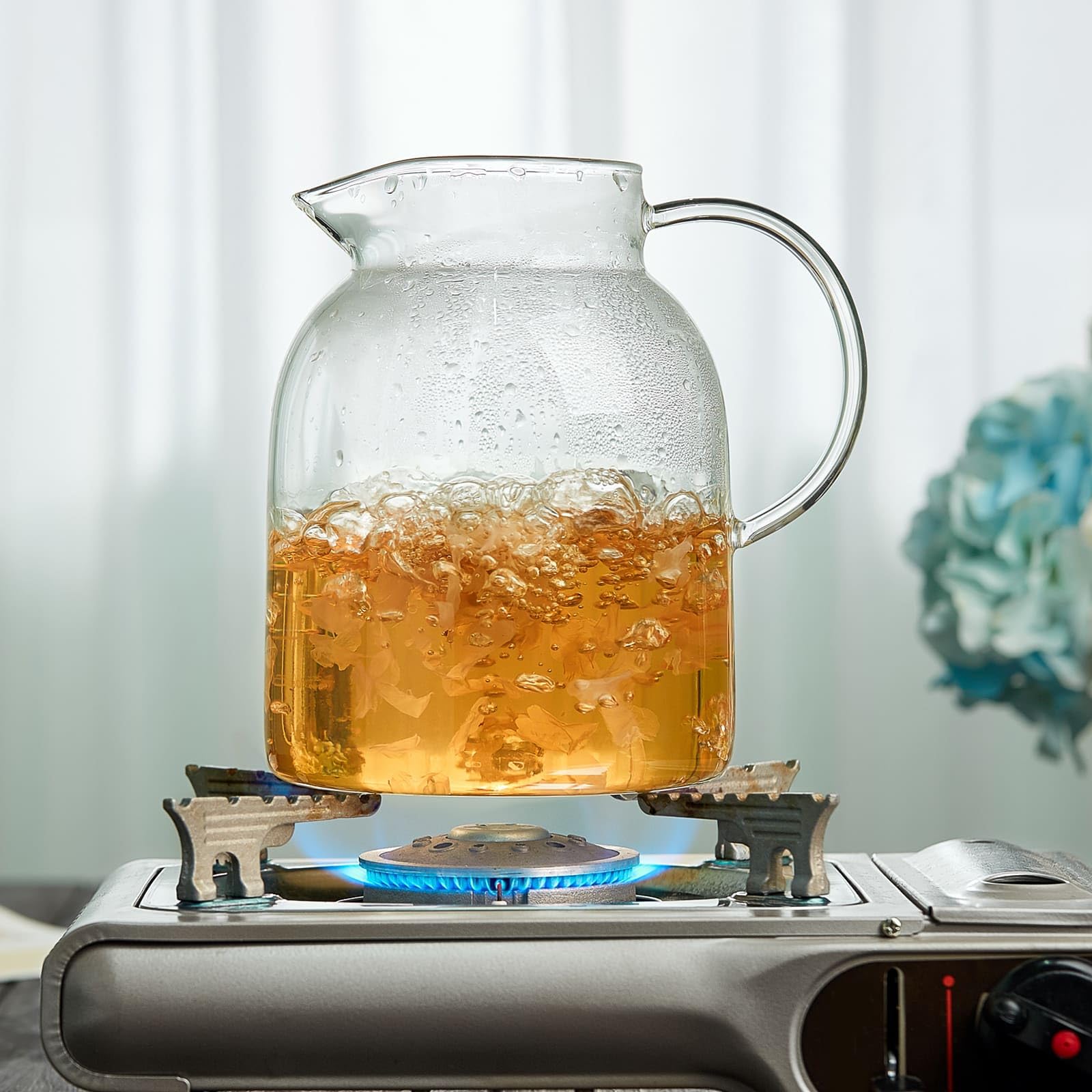 Unbreakable Glass Pitcher displays cold juice with vibrant color.