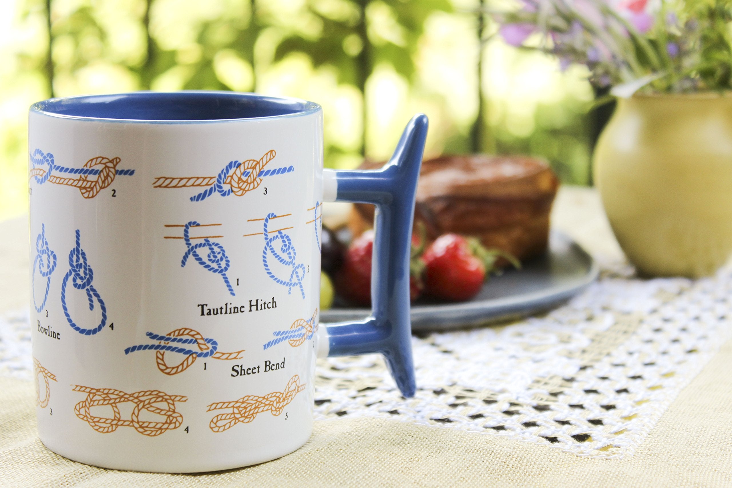 Step-by-step knot guidance inside the mug for eight classic ties.