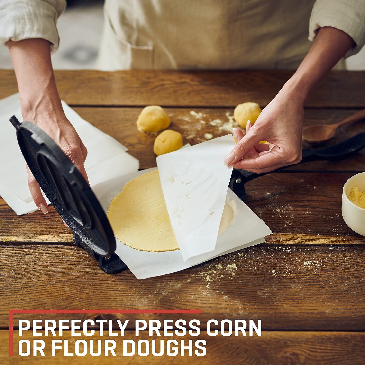 Uno Casa tortilla press with parchment paper kit for quick non-stick prep.