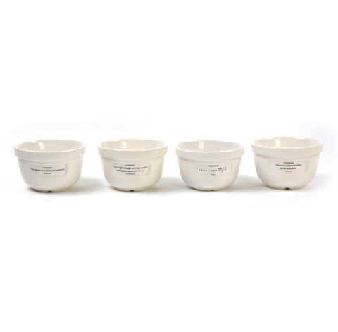 The Unemployed Philosophers Guild ceramic dessert bowls displayed for a clever kitchen display