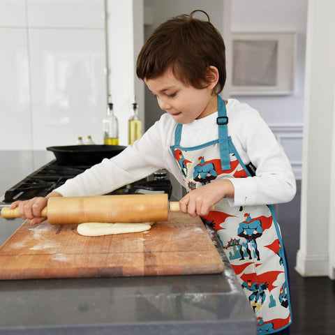 Urban Infant Little Helper apron front pocket keeps small tools handy.