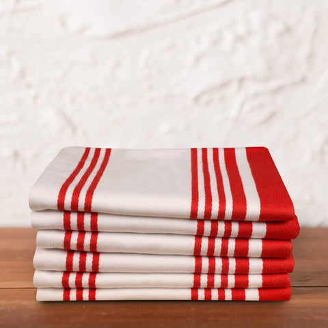 Urban Villa red and white towels add vibrant kitchen color