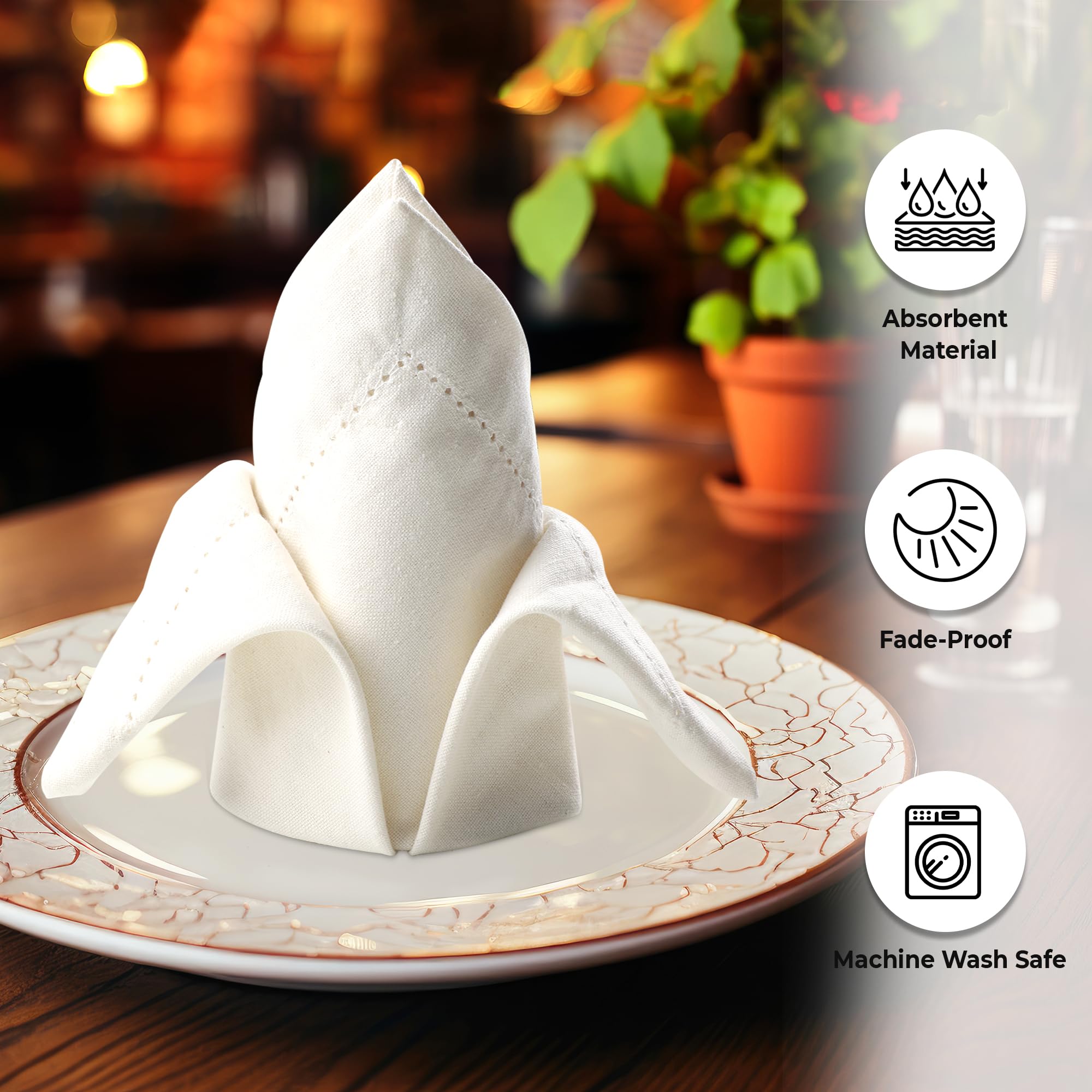 Urban Villa ivory hemstitch napkins arranged in a refined table setting