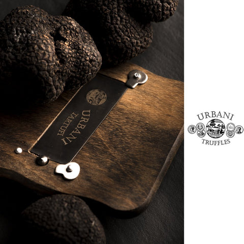 Urbani Truffles cheese and mushroom slicer for even slices and toppings.