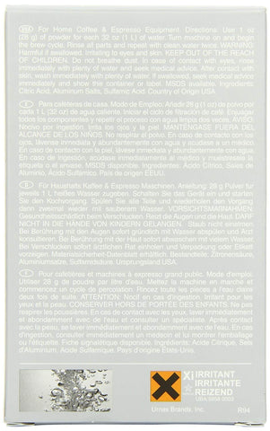 Urnex Dezcal powder dissolving to remove mineral buildup efficiently.