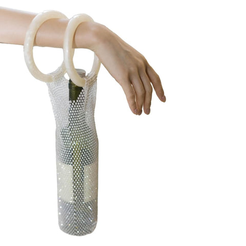 URTERYSER mesh pocket secures rhinestones while carrying bottles.
