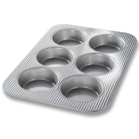 USA Pan 6-Well Mini Round Cake Pans enable precise mini cakes with even heat.