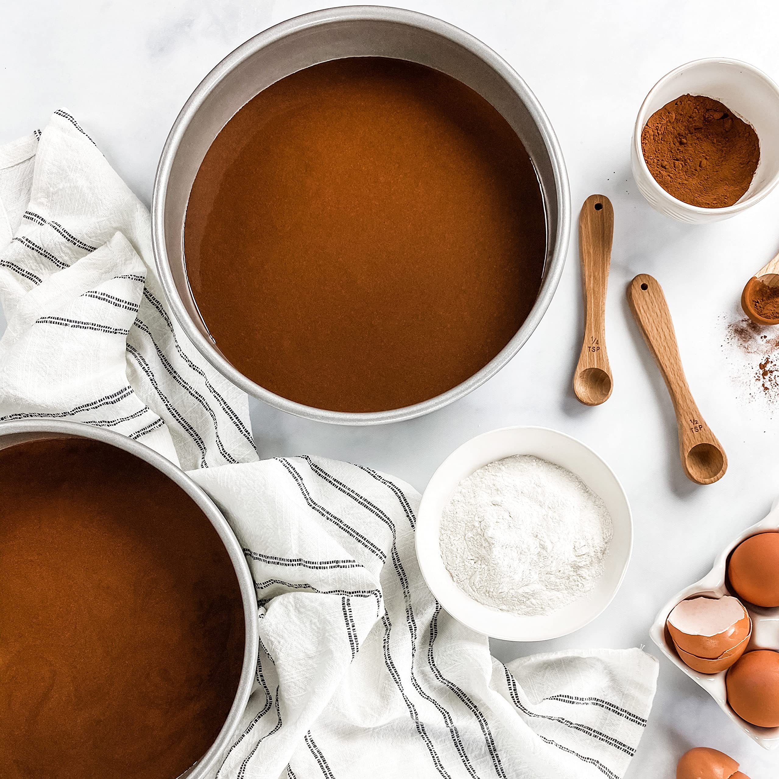 USA Pan 8-inch round cake pan for easy cleanup after baking.