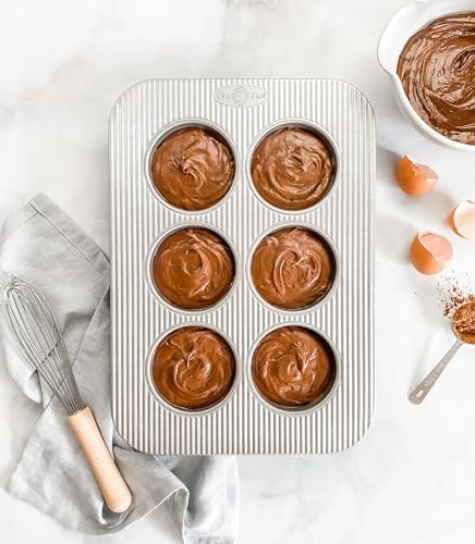 USA Pan aluminized steel muffin pan for 6 cups delivers even heat for consistent baking