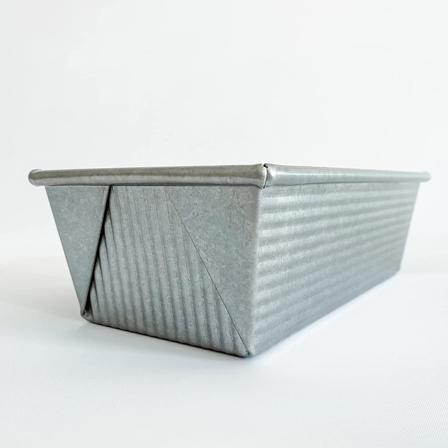 Americoat Plus coating visible for effortless non-stick release.