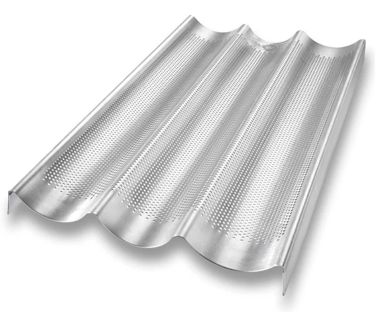 USA Pan baguette bakeware with perforated bottom for crisp crusts and even baking.
