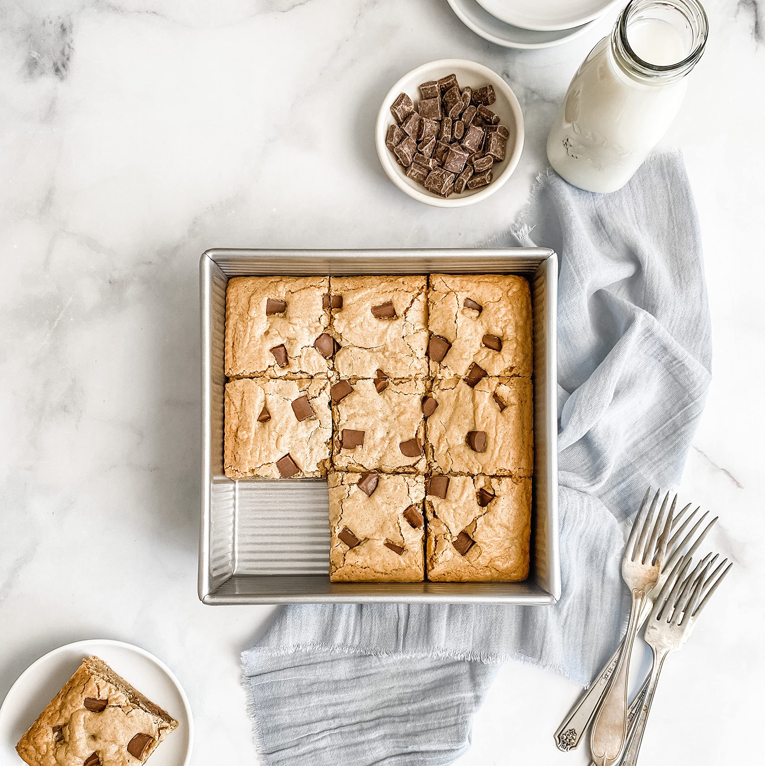 USA Pan in use, showing oven-ready versatility for brownies and casseroles.