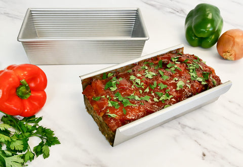Removable insert enables precise loaf shaping and easy serving.
