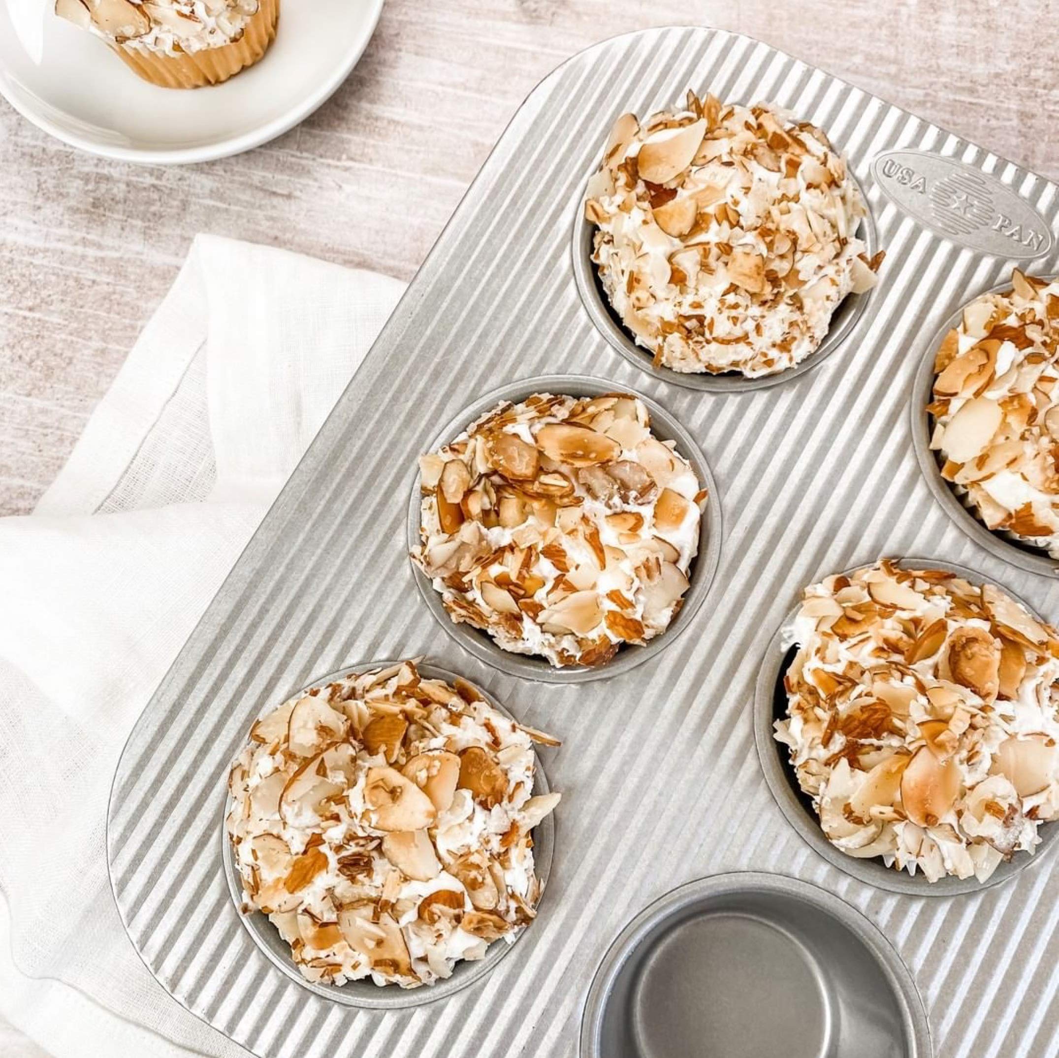 USA Pan fluted top design improves air flow and browning in muffins