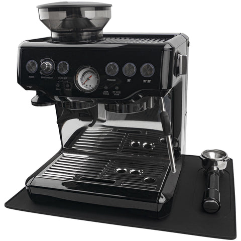USEAMIE silicone mat under coffee machine with lip protects countertops from spills.