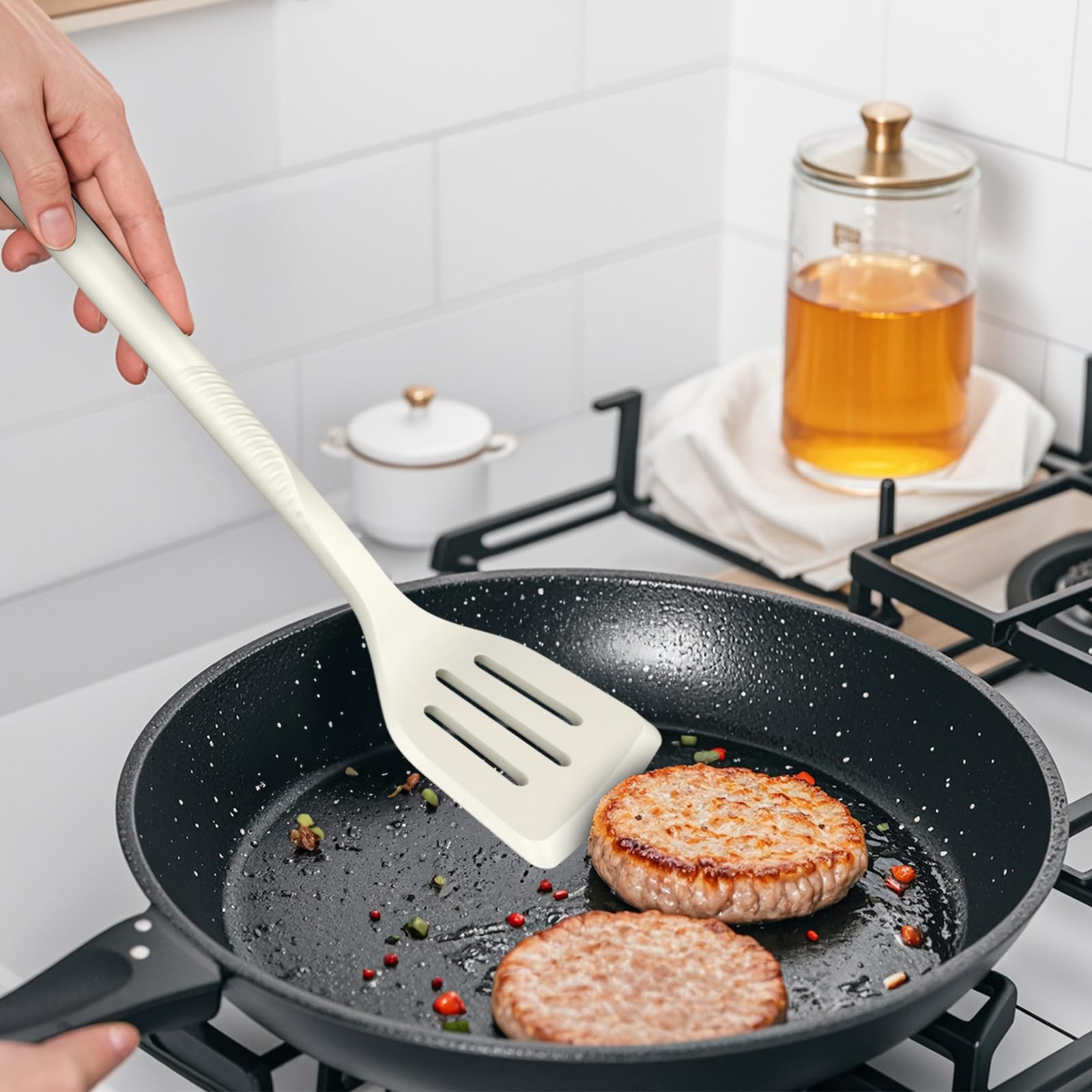 USECANO slotted spoon in cream white, drains liquids without losing ingredients