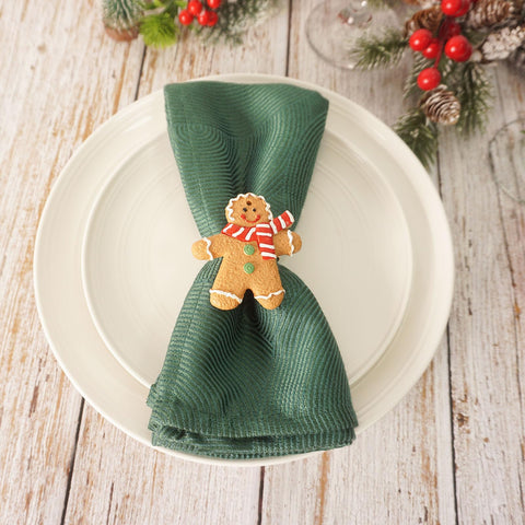 Utalek napkin ring hanging from a Christmas tree enhances seasonal flair