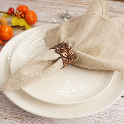 Bronze leaf ring set enhances wedding or holiday table aesthetics