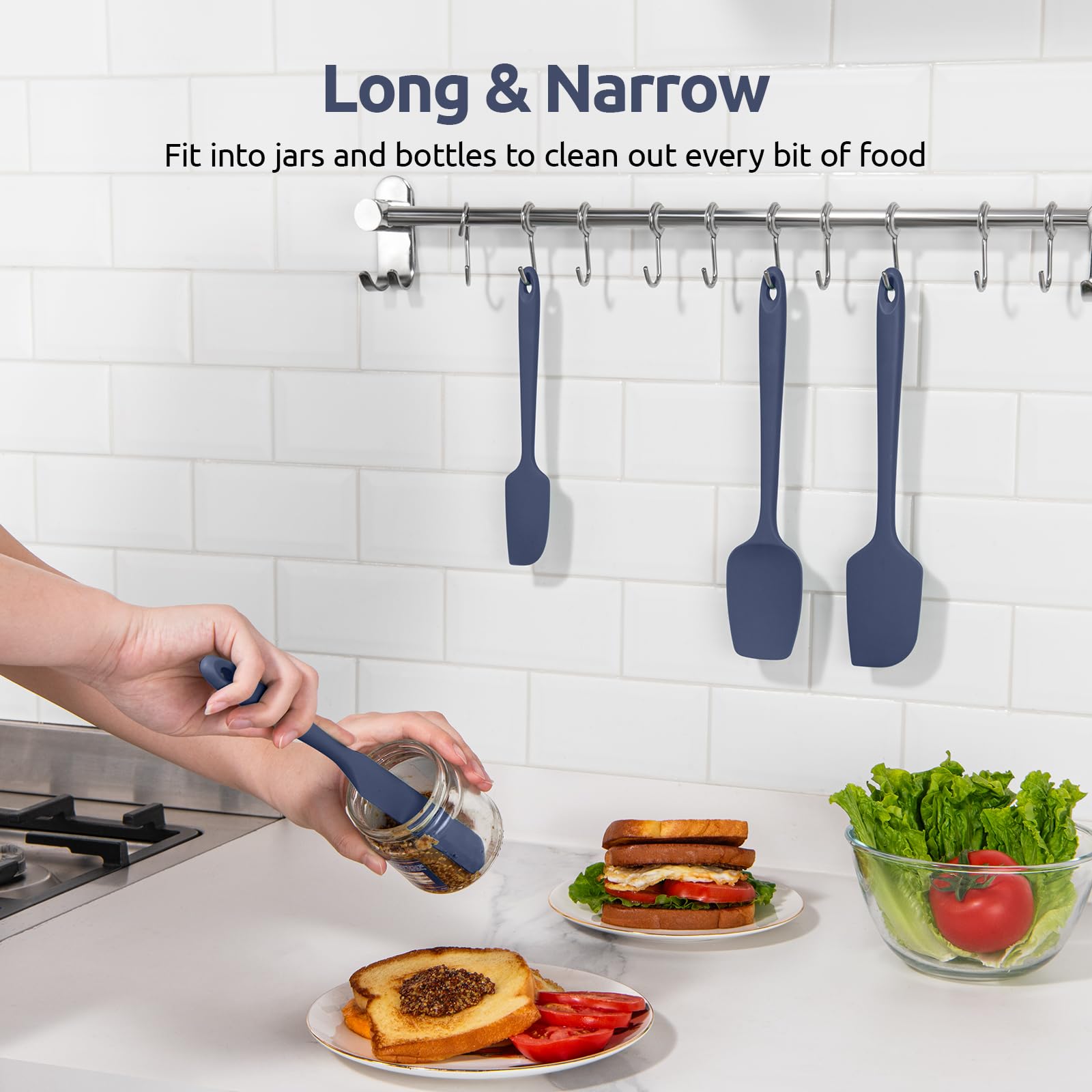 U-Taste midnight blue spatula with ergonomic grip for comfortable use.