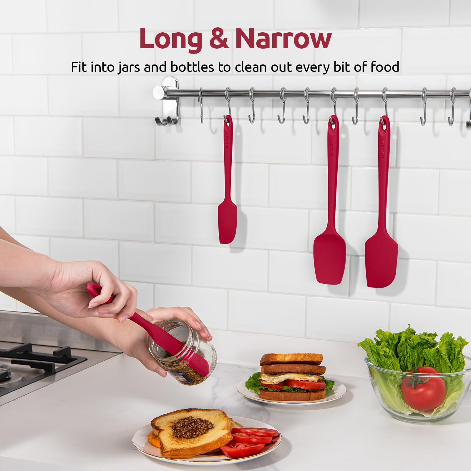 Bright red U-Taste kitchen spatulas brighten the decor and are easy to spot.