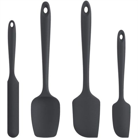 U-Taste jar spatula in action, ideal for scraping jar contents.