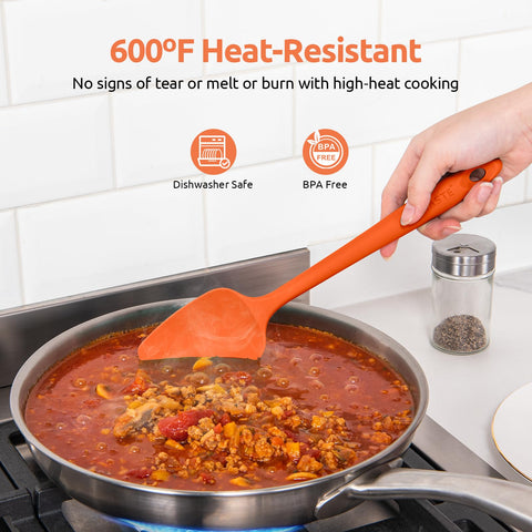 U-Taste orange large spatula reaches bowl corners with balanced stiffness.