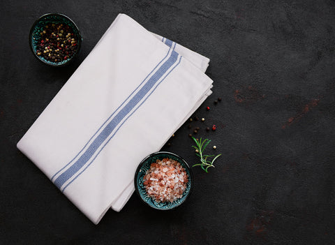 Utopia Towels side stripe design blue towels add subtle style to kitchen tasks.