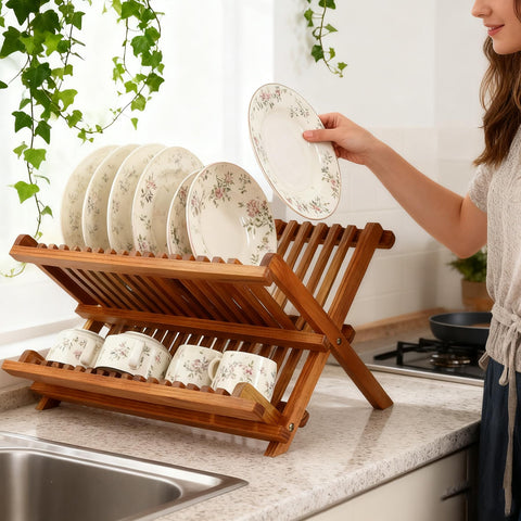 Utoplike teak dish rack top tier for plates, bottom tier for cups.