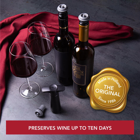 Vacu Vin wine saver with four caps included for replacements.